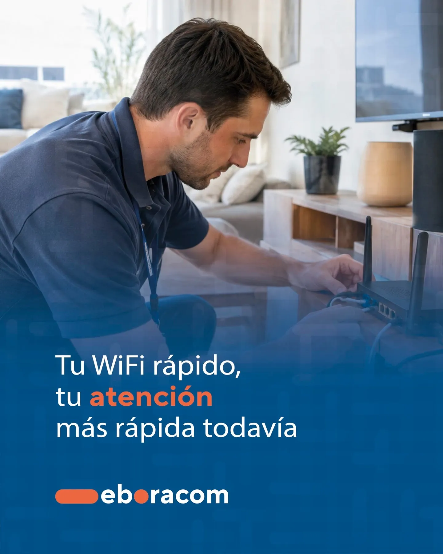 Técnico de Eboracom, operador local de Talavera, revisando el router en el salón de una casa